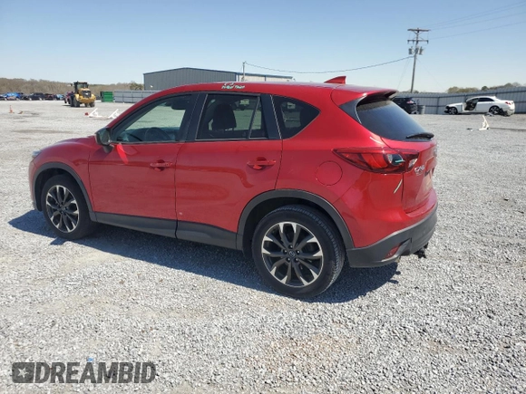 2016 Mazda CX-5 Grand Touring z VIN JM3KE2DYXG0840777, wystawiony jako Copart lot #49700585 z przebiegiem 116 469 mil mil oraz Szkoda całkowita • Salvage title. Historia ofert i sprzedaży dostępna na DreamBid. Obrazek 2.