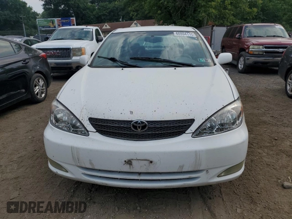 2004 Toyota Camry LE z VIN 4T1BE30K04U301360, wystawiony jako Copart lot #60804115 z przebiegiem 287 009 mil mil oraz Szkoda całkowita • Salvage title. Historia ofert i sprzedaży dostępna na DreamBid. Obrazek 5.