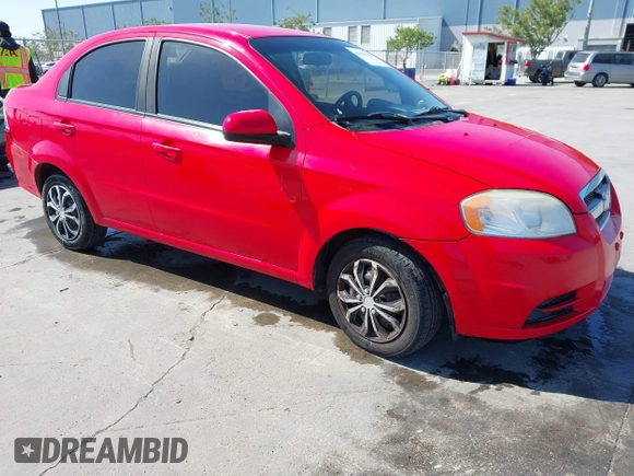 2011 Chevrolet Aveo 1LT z VIN KL1TD5DE0BB151956, wystawiony jako IAAI lot #42083842 z przebiegiem 115 607 mil mil oraz . Historia ofert i sprzedaży dostępna na DreamBid. Obrazek 1.