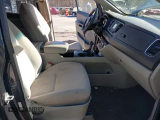 2016 Kia Sedona LX with VIN KNDMB5C17G6083740, listed as a IAAI auction lot 41553959 with 209,536 mi miles. Bid and sale history available at carsss.com. Image 5.