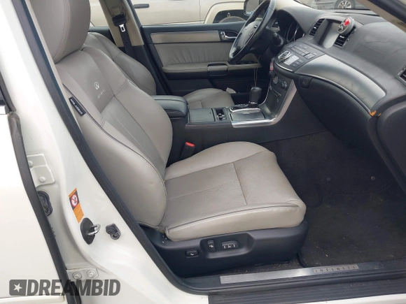 2007 Infiniti M45 Sdn with VIN JNKBY01E57M401878, listed as a IAAI auction lot 41518784 with 84,309 mi miles. Bid and sale history available at carsss.com. Image 5.