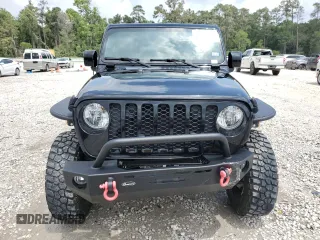 2023 Jeep Gladiator Sport S with VIN 1C6HJTAG9PL525183, listed as a Copart auction lot 54556735 with 13,805 mi miles and Salvage title. Bid and sale history available at DreamBid. Image 5.