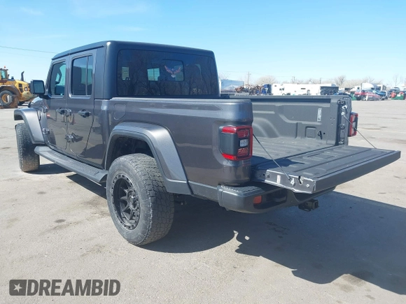 2021 Jeep Gladiator Overland z VIN 1C6HJTFG3ML588042, wystawiony jako IAAI lot #41730427 z przebiegiem 22 344 mil mil oraz . Historia ofert i sprzedaży dostępna na DreamBid. Obrazek 3.
