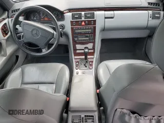 1997 Mercedes-Benz E-Class with VIN WDBJF55F1VA309179, listed as a Copart auction lot 79222994 with 122,100 mi miles and Salvage Title. Bid and sale history available at carsss.com. Image 8.