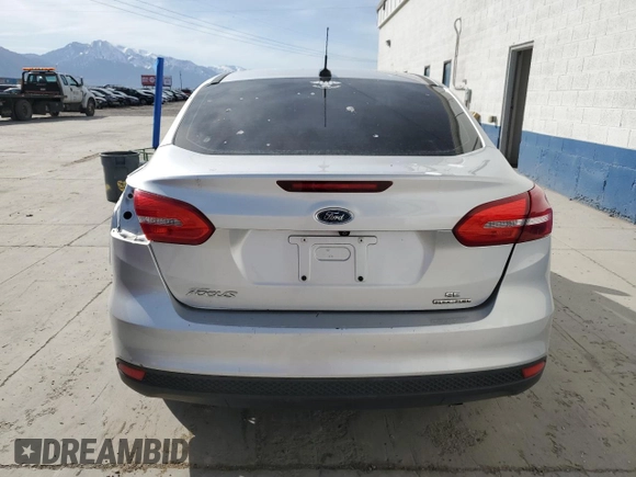 2016 Ford Focus SE with VIN 1FADP3F28GL270003, listed as a Copart auction lot 51852715 with 157,665 mi miles and Salvage Title. Bid and sale history available at DreamBid. Image 6.
