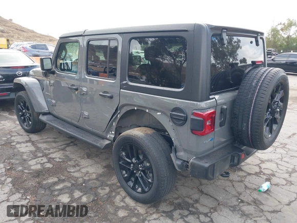 2021 Jeep Wrangler Unlimited Sahara with VIN 1C4JJXP64MW720263, listed as a IAAI auction lot 41514302 with 73,300 mi miles and . Bid and sale history available at DreamBid. Image 3.