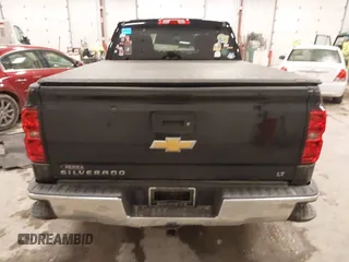 2016 Chevrolet Silverado 1500 LT with VIN 1GCVKREC5GZ176474, listed as a IAAI auction lot 41983780 with 118,587 mi miles and . Bid and sale history available at DreamBid. Image 16.