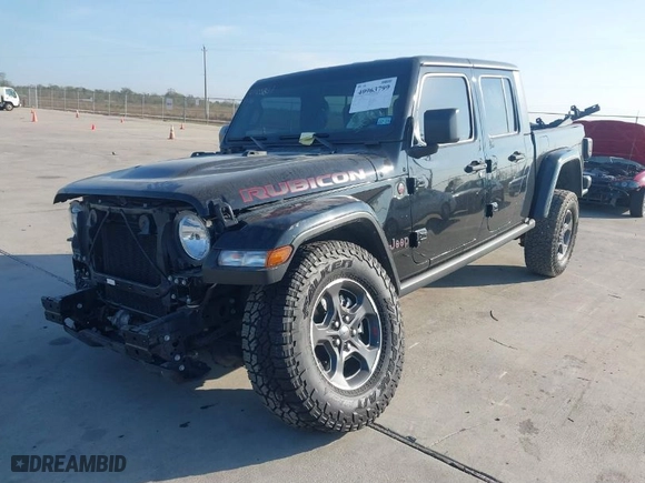 2023 Jeep Gladiator Rubicon with VIN 1C6JJTBGXPL543787, listed as a IAAI auction lot 40963799 with 5,402 mi miles. Bid and sale history available at carsss.com. Image 2.