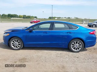 2017 Ford Fusion SE z VIN 3FA6P0H78HR195208, wystawiony jako IAAI lot #40384232 z przebiegiem 166 927 mil mil oraz . Historia ofert i sprzedaży dostępna na DreamBid. Obrazek 14.
