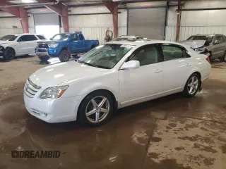 2005 Toyota Avalon XL z VIN 4T1BK36B65U040544, wystawiony jako Copart lot #58507125 z przebiegiem 202 461 mil mil oraz Czysty tytuł • Clean title. Historia ofert i sprzedaży dostępna na DreamBid. Obrazek 1.