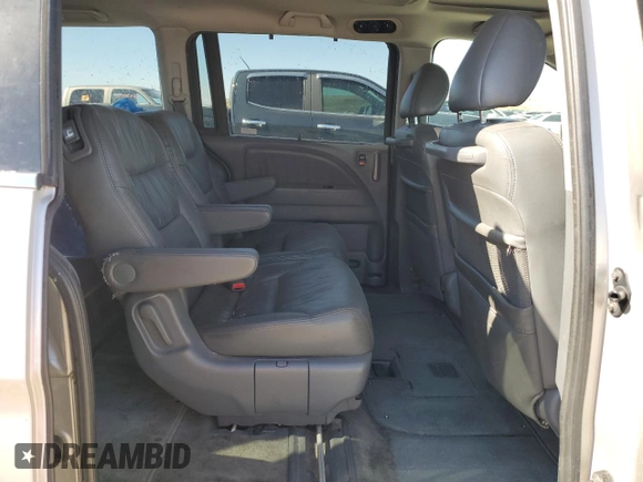 2007 Honda Odyssey EX-L z VIN 5FNRL38647B028078, wystawiony jako Copart lot #56208005 z przebiegiem 192 000 mil mil oraz Szkoda całkowita • Salvage title. Historia ofert i sprzedaży dostępna na DreamBid. Obrazek 10.