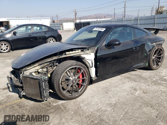 2015 Porsche 911 GT3 z VIN WP0AC2A93FS183704, wystawiony jako Copart lot #76139704 z przebiegiem 33 935 mil mil oraz Szkoda całkowita • Salvage title. Historia ofert i sprzedaży dostępna na DreamBid. Obrazek 1.