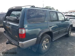 1997 Toyota 4Runner Limited with VIN JT3GN87R7V0025430, listed as a IAAI auction lot 39059743 with 238,915 mi miles. Bid and sale history available at carsss.com. Image 4.