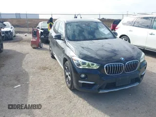 2016 BMW X1 xDrive28i with VIN WBXHT3Z3XG4A48557, listed as a IAAI auction lot 41387960 with 84,821 mi miles. Bid and sale history available at carsss.com. Image 1.