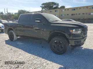 2021 Ram 1500 Lone Star with VIN 1C6RREFT2MN660620, listed as a Copart auction lot 49831035 with 49,276 mi miles and Salvage title. Bid and sale history available at DreamBid. Image 4.