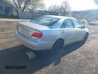 2004 Toyota Camry LE with VIN 4T1BE32K64U282875, listed as a IAAI auction lot 42038006 with 238,605 mi miles. Bid and sale history available at carsss.com. Image 4.
