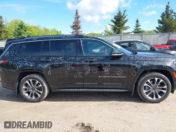 2021 Jeep Grand Cherokee Overland z VIN 1C4RJKDG9M8119728, wystawiony jako IAAI lot #42324696 z przebiegiem 48 379 mil mil oraz . Historia ofert i sprzedaży dostępna na DreamBid. Obrazek 13.