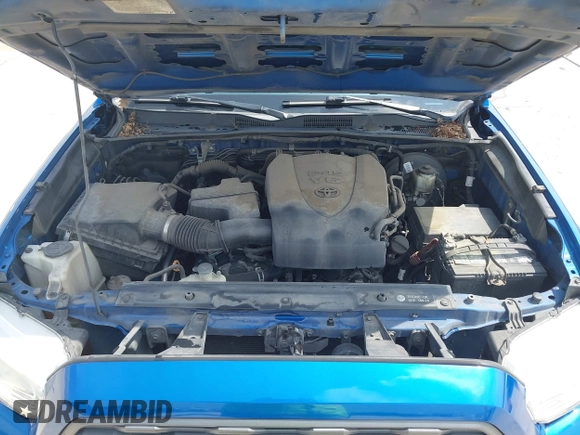 2018 Toyota Tacoma SR5 z VIN 5TFAZ5CN2JX064452, wystawiony jako IAAI lot #41945468 z przebiegiem 132 450 mil mil oraz . Historia ofert i sprzedaży dostępna na DreamBid. Obrazek 10.