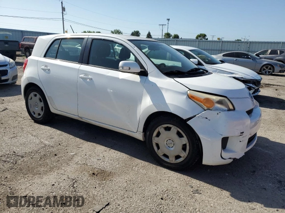 2009 Scion xD with VIN JTKKU10439J046749, listed as a Copart auction lot 60918345 with 126,995 mi miles and Salvage title. Bid and sale history available at DreamBid. Image 4.