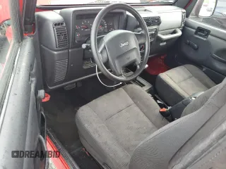 2005 Jeep Wrangler X z VIN 1J4FA39S15P337816, wystawiony jako Copart lot #55957725 z przebiegiem 107 030 mil mil oraz Szkoda całkowita • Salvage title. Historia ofert i sprzedaży dostępna na DreamBid. Obrazek 8.