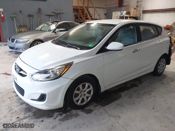 2013 Hyundai Accent GL with VIN KMHCT5AE6DU122559, listed as a IAAI auction lot 41800714 with 129,582 mi miles. Bid and sale history available at carsss.com. Image 17.