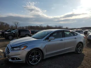 2016 Ford Fusion Titanium with VIN 3FA6P0D99GR278636, listed as a Copart auction lot 50372025 with 164,485 mi miles and Salvage title. Bid and sale history available at DreamBid. Image 1.