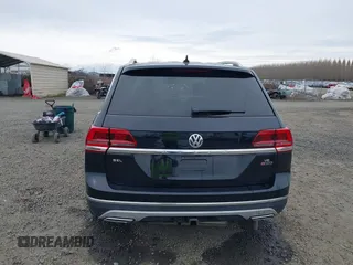 2018 Volkswagen Atlas SEL Premium z VIN 1V2NR2CAXJC554740, wystawiony jako IAAI lot #41773681 z przebiegiem 83 296 mil mil oraz . Historia ofert i sprzedaży dostępna na DreamBid. Obrazek 16.