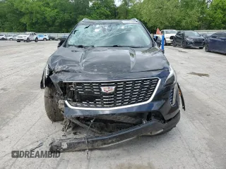 2020 Cadillac XT4 FWD Premium Luxury with VIN 1GYFZCR46LF113499, listed as a Copart auction lot 57534205 with 64,859 mi miles and Salvage title. Bid and sale history available at DreamBid. Image 5.