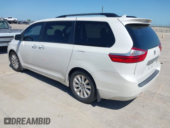 2015 Toyota Sienna XLE with VIN 5TDYK3DC8FS666113, listed as a IAAI auction lot 41999037 with 179,566 mi miles and . Bid and sale history available at carsss.com. Image 3.