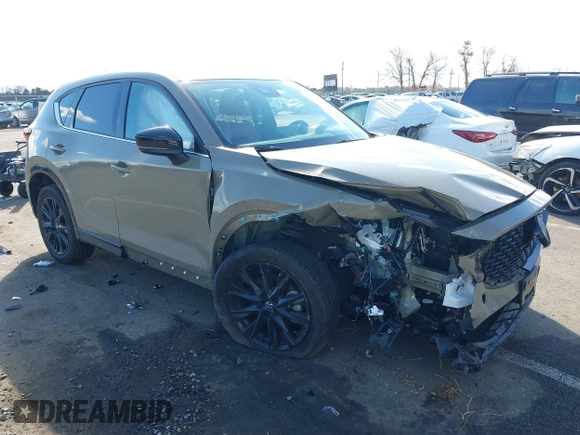 2024 Mazda CX-5 Carbon Edition with VIN JM3KFBAYXR0371954, listed as a IAAI auction lot 41688598 with 13,230 mi miles and . Bid and sale history available at DreamBid. Image 6.