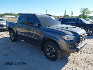 2017 Toyota Tacoma SR5 with VIN 5TFAZ5CNXHX050289, listed as a IAAI auction lot 41771576 with 68,735 mi miles. Bid and sale history available at carsss.com. Image 1.