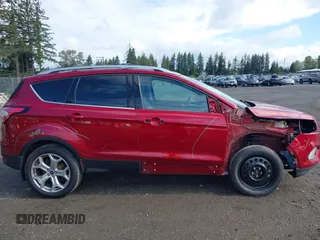 2018 Ford Escape Titanium with VIN 1FMCU9J99JUB44963, listed as a IAAI auction lot 42293113 with 68,803 mi miles and . Bid and sale history available at DreamBid. Image 14.