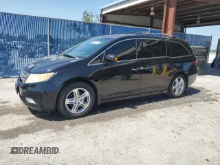 2011 Honda Odyssey Touring с VIN 5FNRL5H98BB014201, выставлен на аукционе Copart как лот 56861155 с пробегом 205 296 миль миль и Списание • Salvage title. История ставок и продаж доступна на DreamBid. Изображение 1.
