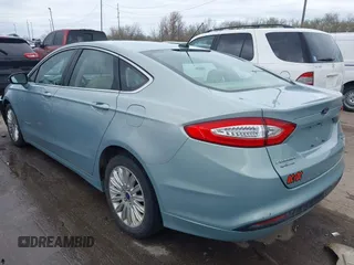 2013 Ford Fusion SE Hybrid with VIN 3FA6P0LUXDR339767, listed as a IAAI auction lot 41920621 with 135,274 mi miles. Bid and sale history available at carsss.com. Image 3.