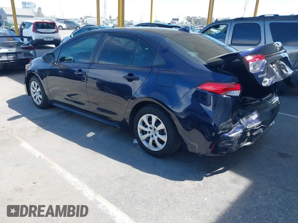 2022 Toyota Corolla LE with VIN 5YFEPMAE0NP320936, listed as a IAAI auction lot 42010316 with 21,686 mi miles. Bid and sale history available at carsss.com. Image 3.