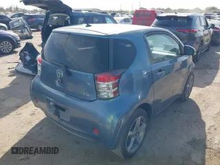 2012 Scion iQ with VIN JTNJJXB09CJ019082, listed as a IAAI auction lot 41798707 with 120,628 mi miles. Bid and sale history available at carsss.com. Image 4.