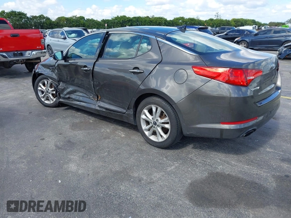 2011 Kia Optima EX with VIN KNAGN4A74B5164311, listed as a IAAI auction lot 41558907 with Not Provided miles and . Bid and sale history available at carsss.com. Image 3.