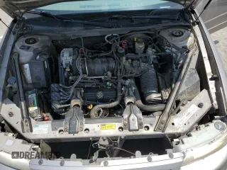 1998 Buick Regal LS with VIN 2G4WB52K7W1543743, listed as a Copart auction lot 60970515 with 142,559 mi miles and Salvage title. Bid and sale history available at DreamBid. Image 11.