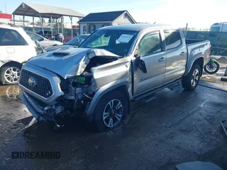 2018 Toyota Tacoma SR with VIN 5TFCZ5AN3JX151479, listed as a IAAI auction lot 41428376 with 104,717 mi miles. Bid and sale history available at carsss.com. Image 19.