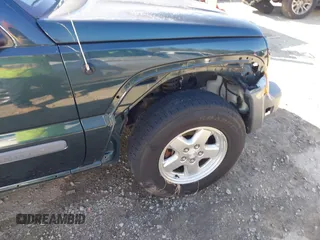 2005 Jeep Liberty Sport with VIN 1J4GL48K05W584675, listed as a IAAI auction lot 41867491 with 112,882 mi miles. Bid and sale history available at carsss.com. Image 17.