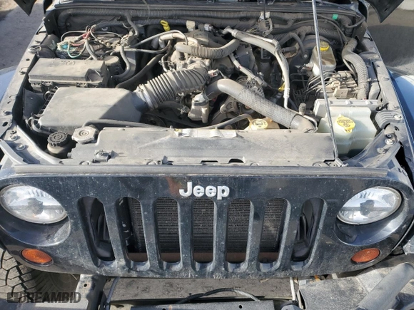 2008 Jeep Wrangler Unlimited Sahara with VIN 1J4GA59108L654912, listed as a Copart auction lot 48170345 with 114,638 mi miles and Salvage Title. Bid and sale history available at carsss.com. Image 14.
