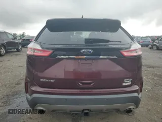 2019 Ford Edge SEL with VIN 2FMPK4J92KBB34891, listed as a Copart auction lot 60050945 with 104,942 mi miles and Salvage title. Bid and sale history available at DreamBid. Image 6.