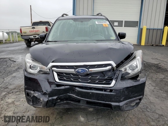 2017 Subaru Forester Touring with VIN JF2SJATC7HH437543, listed as a Copart auction lot 60866985 with 50,532 mi miles and Salvage title. Bid and sale history available at DreamBid. Image 5.