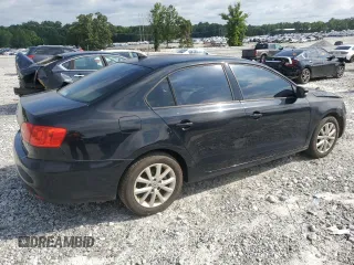 2012 Volkswagen Jetta SE with VIN 3VWDX7AJ3CM114196, listed as a Copart auction lot 61236545 with 128,893 mi miles and Salvage title. Bid and sale history available at DreamBid. Image 3.