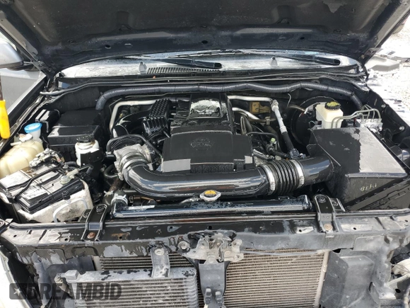 2016 Nissan Frontier S with VIN 1N6AD0EV2GN904889, listed as a Copart auction lot 60054185 with 88,342 mi miles and Salvage title. Bid and sale history available at DreamBid. Image 11.