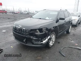 2019 Jeep Cherokee Latitude with VIN 1C4PJLCB1KD339906, listed as a IAAI auction lot 41539248 with 123,243 mi miles and . Bid and sale history available at carsss.com. Image 6.