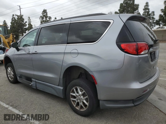 2021 Chrysler Voyager LXI with VIN 2C4RC1DG0MR558048, listed as a Copart auction lot 53742615 with 142,359 mi miles and Clean Title. Bid and sale history available at carsss.com. Image 2.