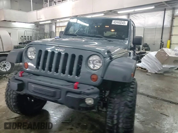 2013 Jeep Wrangler Unlimited Rubicon with VIN 1C4BJWFG7DL691514, listed as a Copart auction lot 42449245 with 114,640 mi miles and Salvage Title. Bid and sale history available at carsss.com. Image 15.