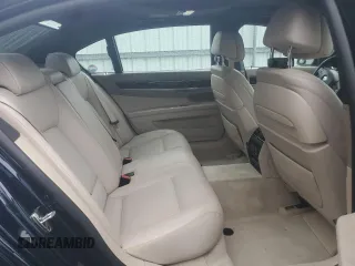 2015 BMW 7 Series 750Li z VIN WBAYE8C51FD781314, wystawiony jako Copart lot #56537395 z przebiegiem 69 682 mil mil oraz Szkoda całkowita • Salvage title. Historia ofert i sprzedaży dostępna na DreamBid. Obrazek 10.