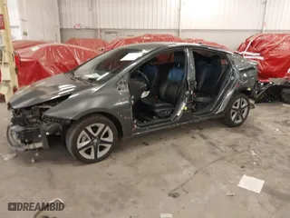 2016 Toyota Prius Four with VIN JTDKARFU5G3000380, listed as a IAAI auction lot 41671182 with 147,513 mi miles. Bid and sale history available at carsss.com. Image 2.